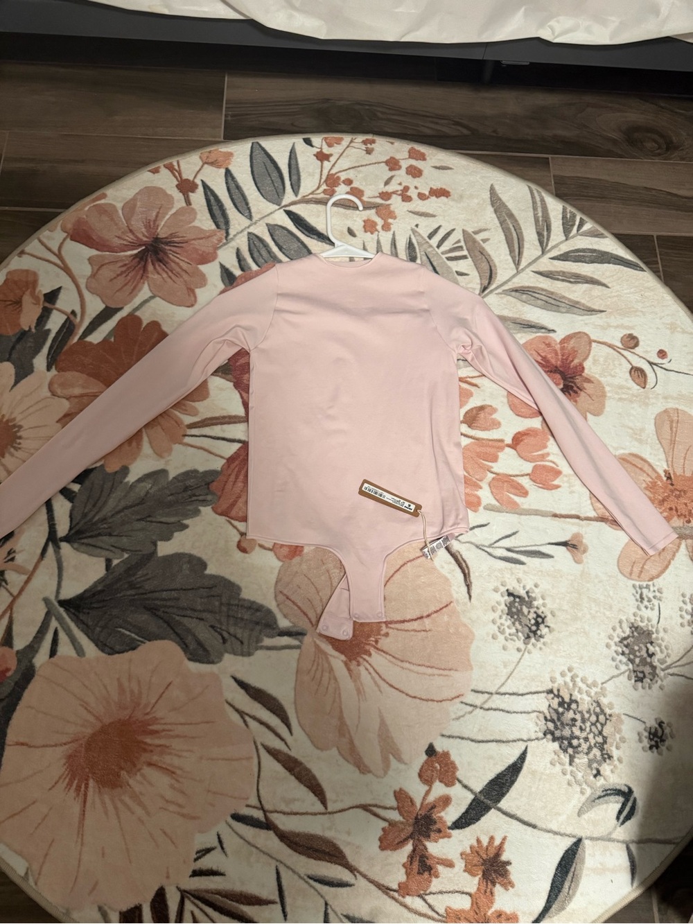 SKIMS Long-Sleeve Pale Pink Kids One-Piece Bodysuit